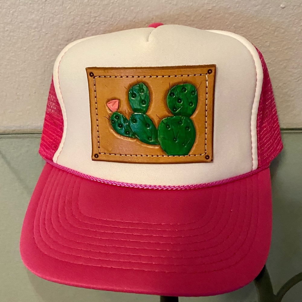 Pink trucker hat with custom cactus leather design